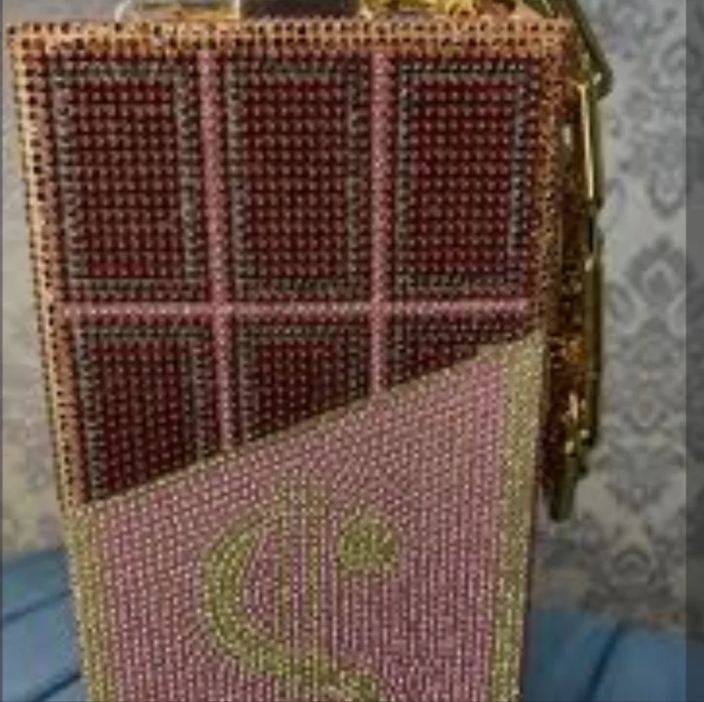 Elegant Pink and Gold Clutch Bag